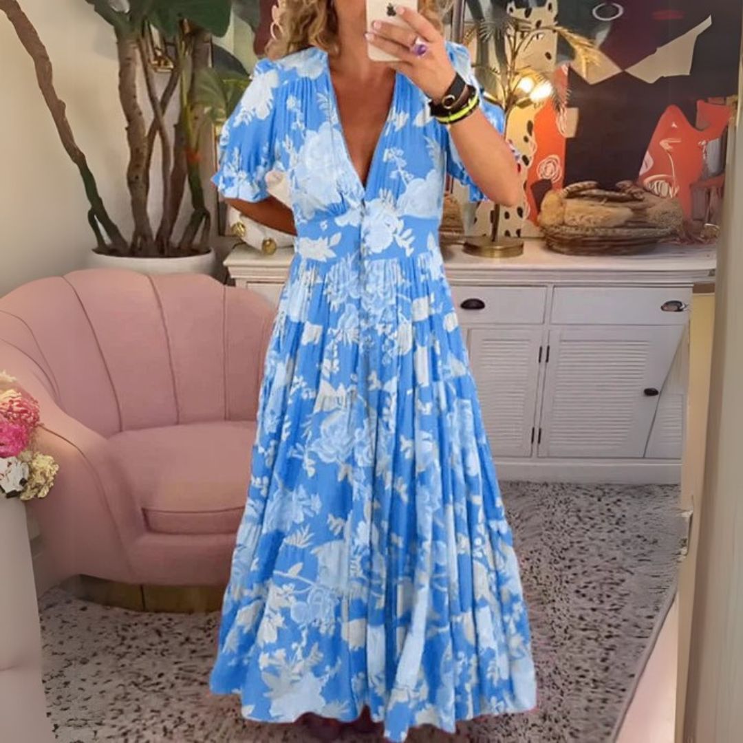 Vestido cómodo con escote en pico y bolsillos